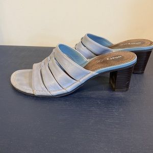 Light blue slip on sandal.